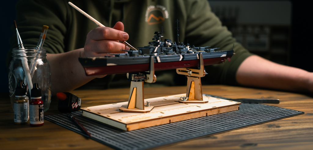 Advance Hobby Frigate jig supporting a model ship during painting